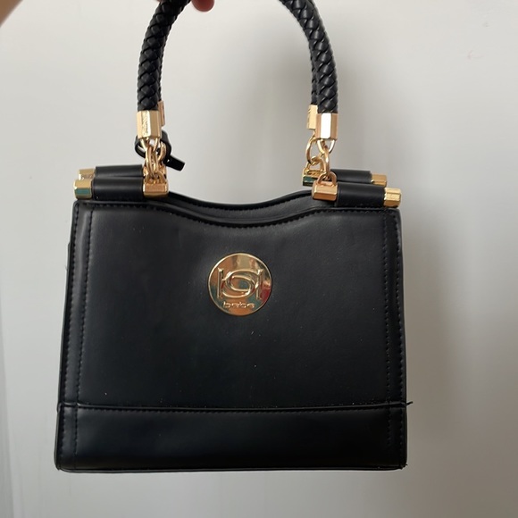 Black and gold Bebe bag comes with Chain so it can be a cross body purse - Picture 2 of 3